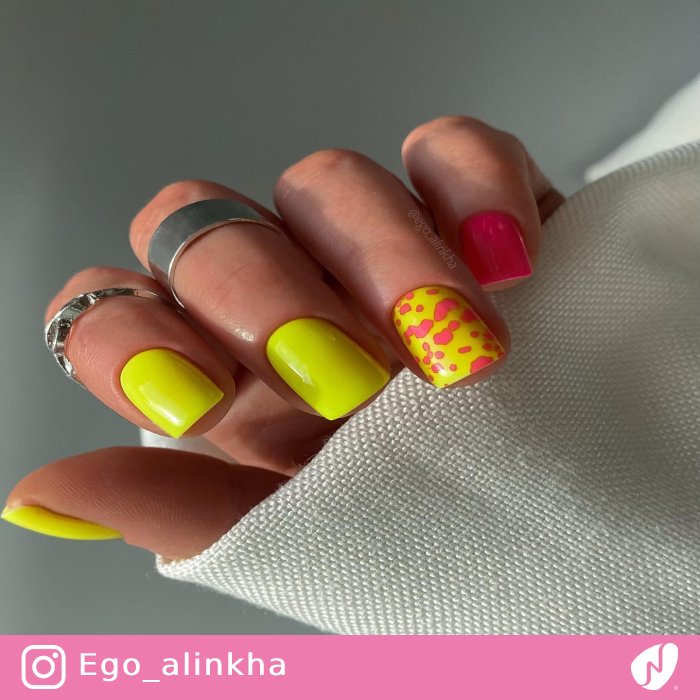 Stamped Pink Design on Neon Nails